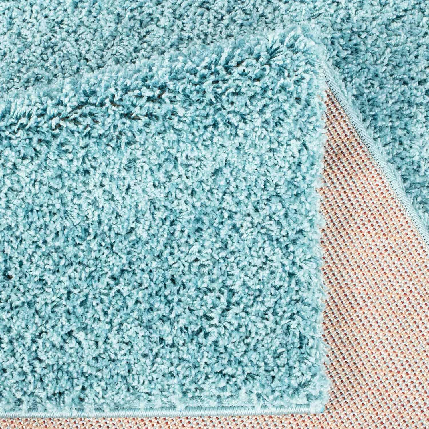 Hoogpolig vloerkleed - Trim (turkoois)