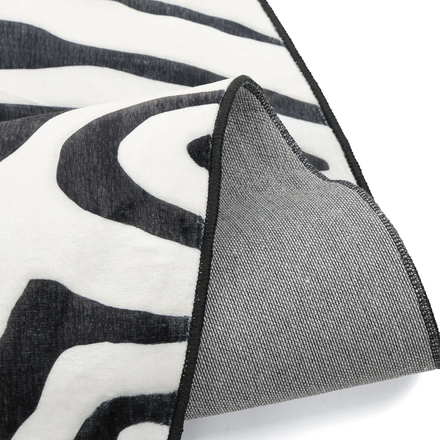 Rond Wilton-vloerkleed met golvende rand - Zebra (zwart/wit)