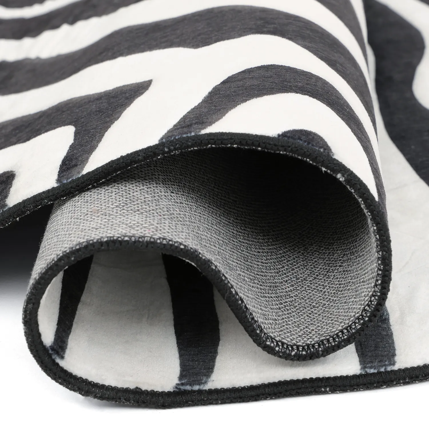 Rond Wilton-vloerkleed met golvende rand - Zebra (zwart/wit)