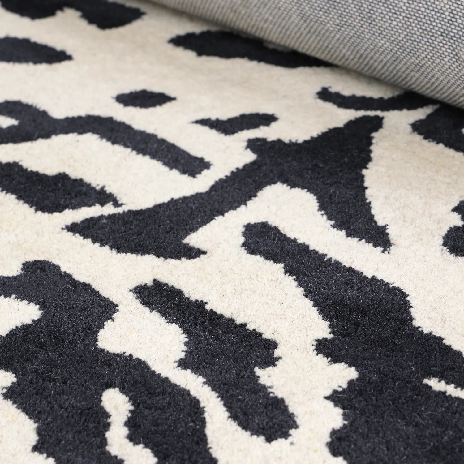 Hoogpolig vloerkleed - Zebra Tufted Wool Premium (wit/zwart)
