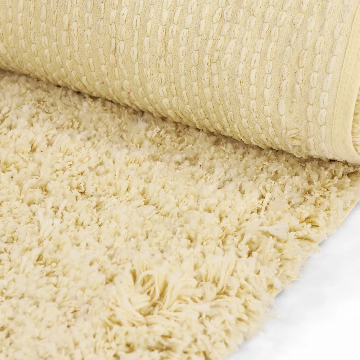 Hoogpolig vloerkleed - Combarro Solid Cotton Shaggy (lichtgeel)