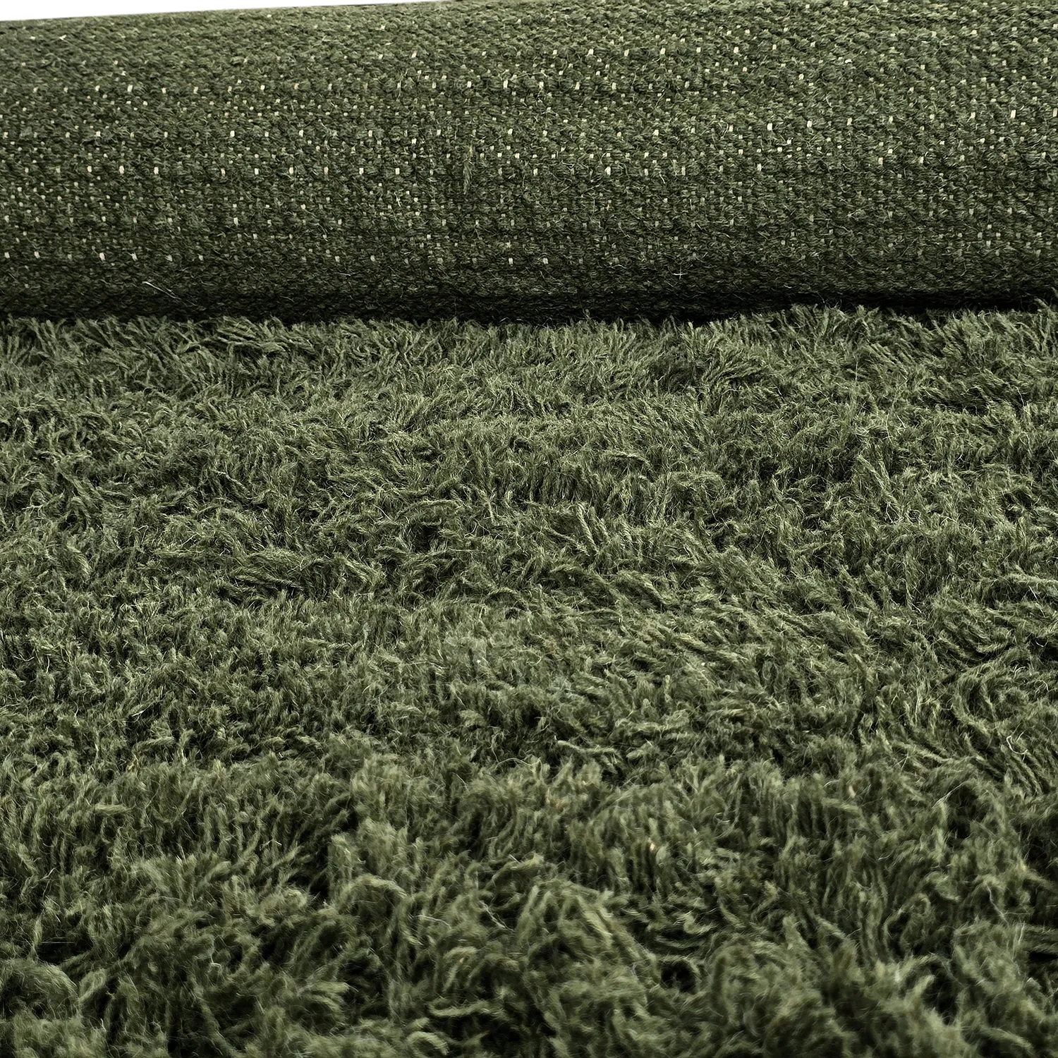 Hoogpolig vloerkleed - Fassale Hand Woven Wool Shaggy (mosgroen)