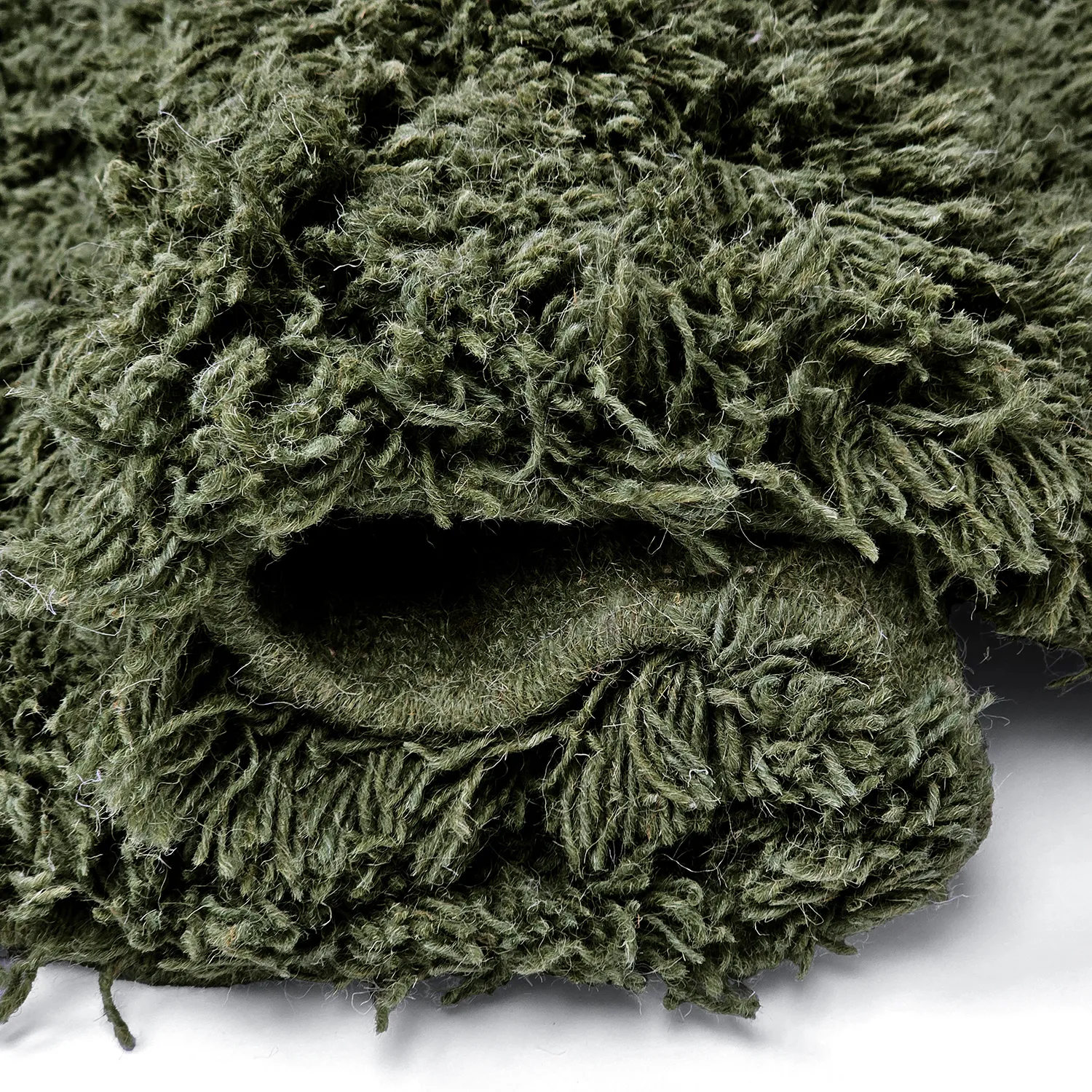 Rond vloerkleed - Fassale Hand Woven Wool Shaggy (mosgroen)