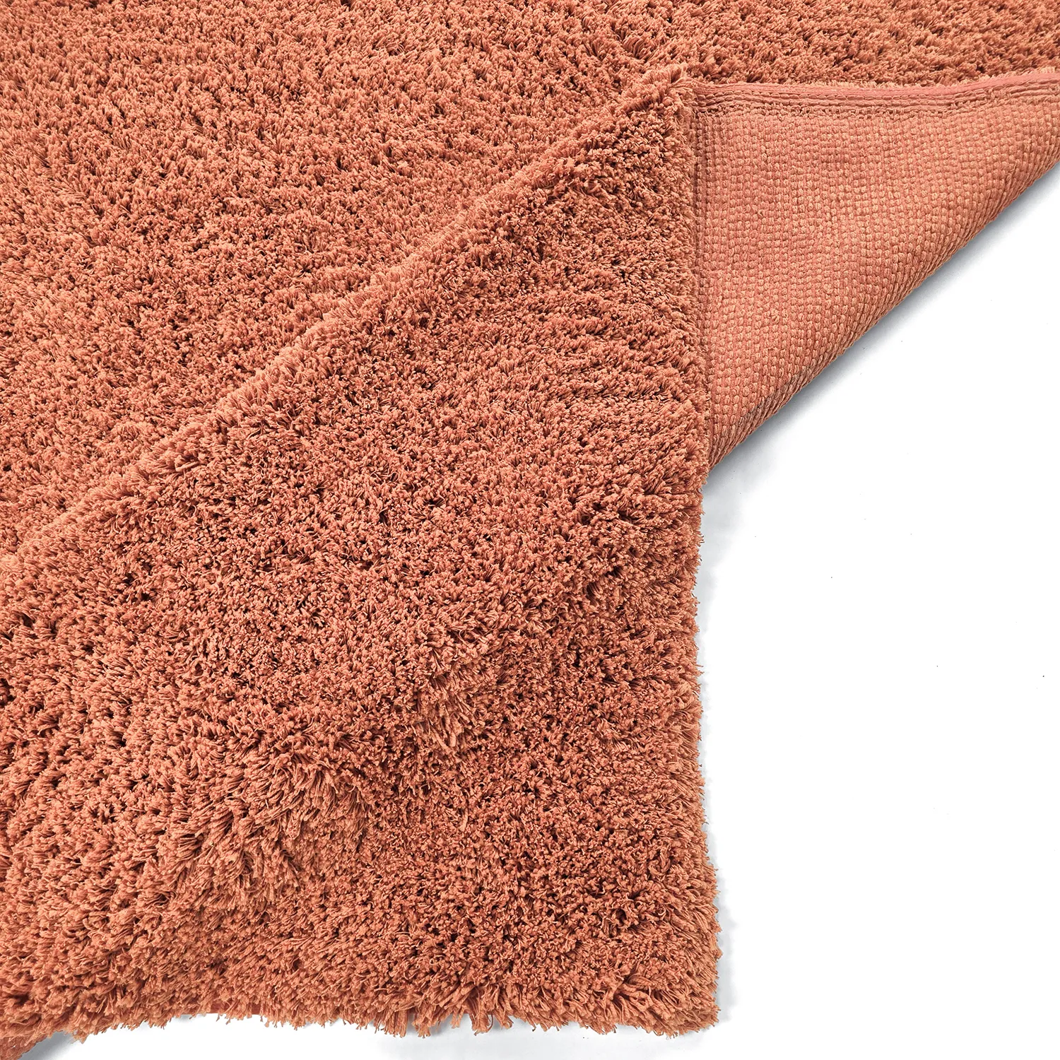 Hoogpolig vloerkleed - Combarro Solid Cotton Shaggy (lichtoranje)